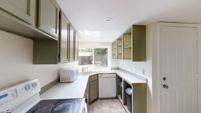 Building Photo - May Valley Road business opportunity available - 2 bedroom 1 bath home with carport & office and ...