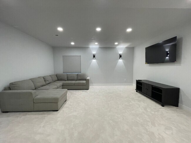 Building Photo - Live Lavishly in Harmony Ridge- Fully Furnished 5-Bedroom Dream Home with Backyard Oasis & Speake...