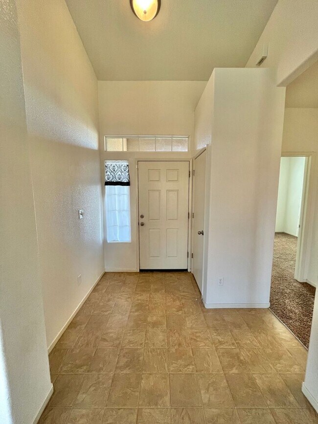 Building Photo - Large Corner Lot Home with Landscaping included!