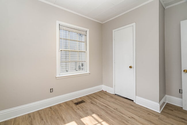 Building Photo - 617 W Garrison Blvd