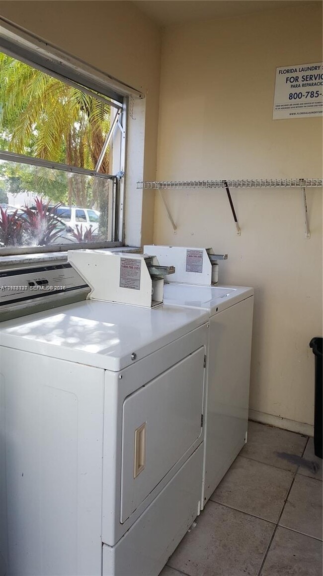 Building Photo - 3090 Coral Springs Dr