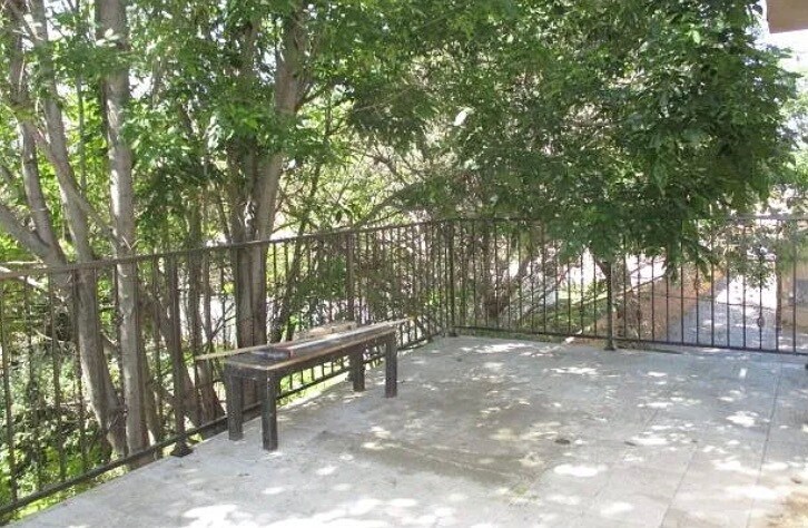Building Photo - 6848 Encino Ave