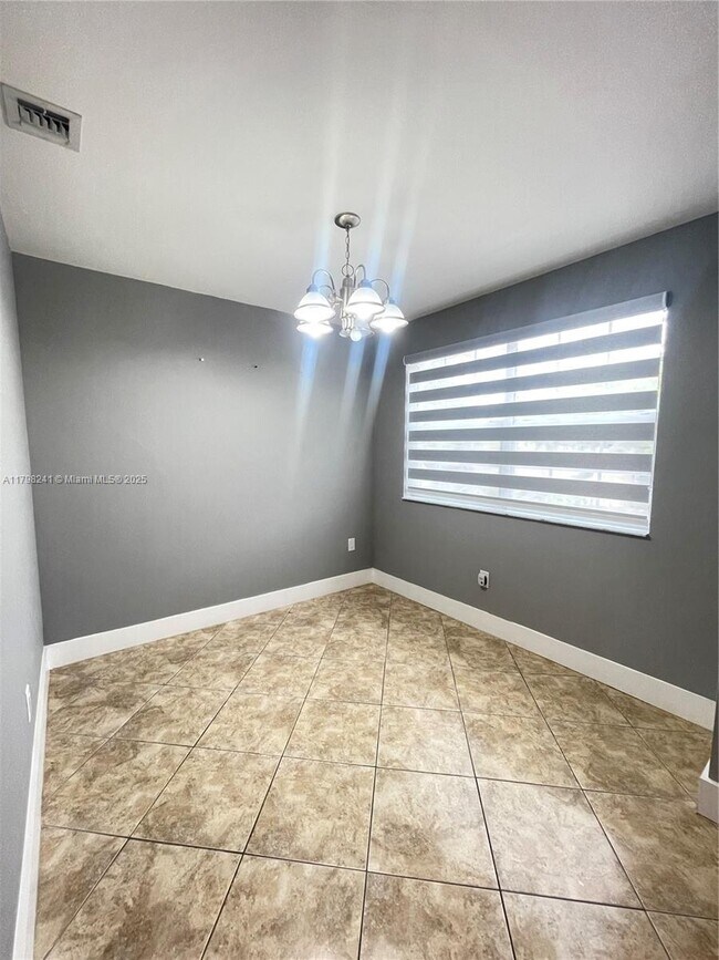 Building Photo - 18310 NW 68th Ave