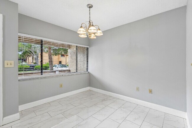 Building Photo - Fully Renovated 2-Bedroom Condo—Just 1 Mile from Universal!