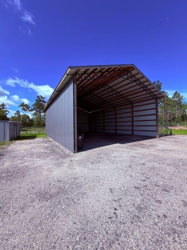 Building Photo - Gated 10-Acre Luxury Retreat with 40x60 Shop & Barn!