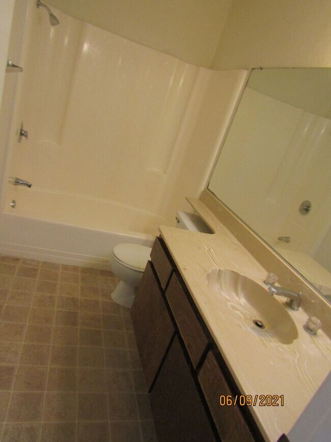 Building Photo - Centrally Located Large Two Story Condo wi...