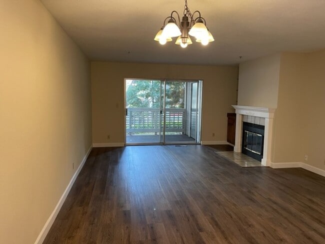 Building Photo - Wonderful lower level Condo with Laminate ...