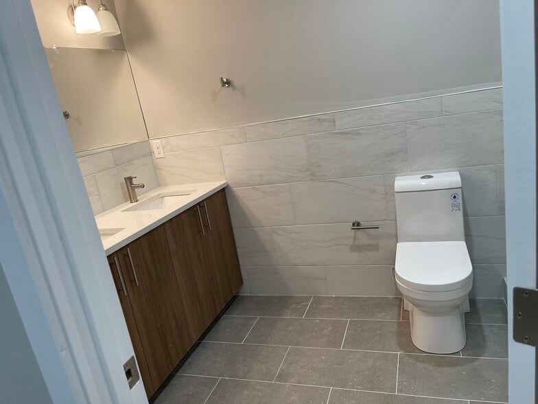 downstairs bathroom vanity with double sinks - 1624 W Stiles St