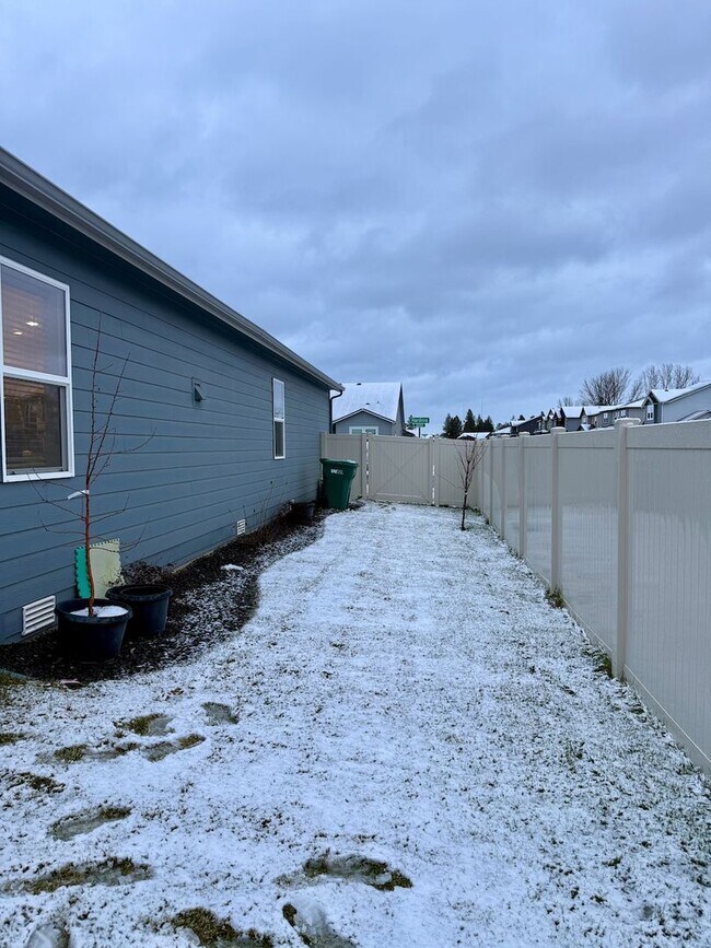 Building Photo - New Construction 4 Bed Mead School District Rancher w/ Fully-Fenced Yard and Attached Garage!