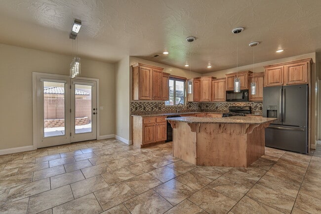 Building Photo - "Spacious 4-Bedroom Retreat with 3,584 Sq ...