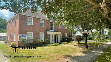 Building Photo - Charming Downtown Apartment