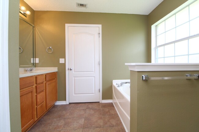 Building Photo - Executive 3-Bedroom Brick Home with Florid...