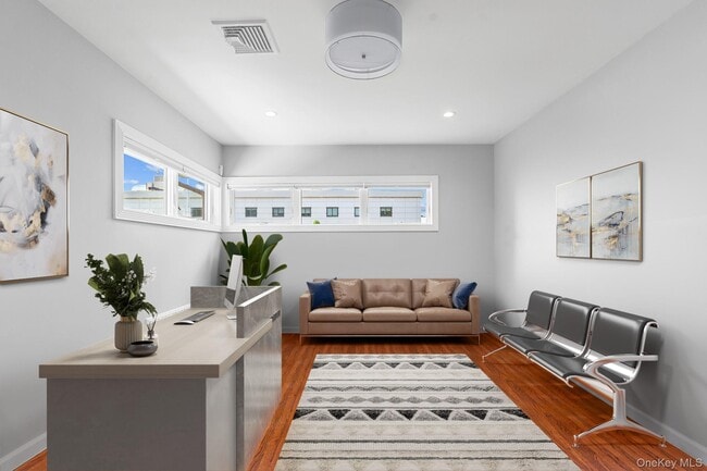 Building Photo - 214-26 24th Ave