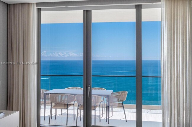 Building Photo - 18975 Collins Ave