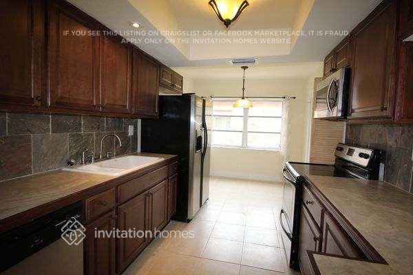Building Photo - 5365 SW 10th Ct