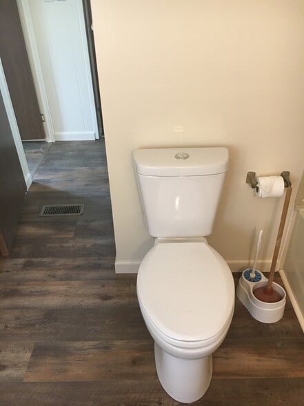 New high efficiency toilet - 1115 3rd St