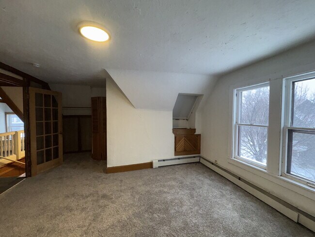 Building Photo - "Charming Studio Gem with Office and Hardwood Floors in the Heart of Minneapolis!"