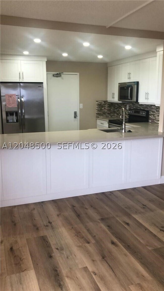 Building Photo - 10777 W Sample Rd