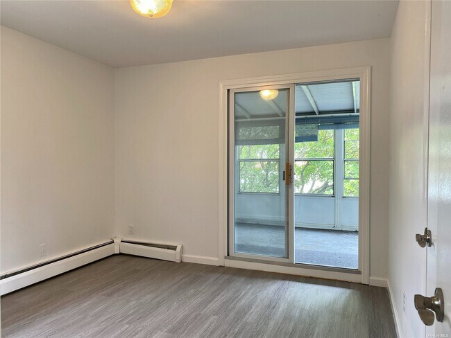 Building Photo - 160-15-16016 16th Ave