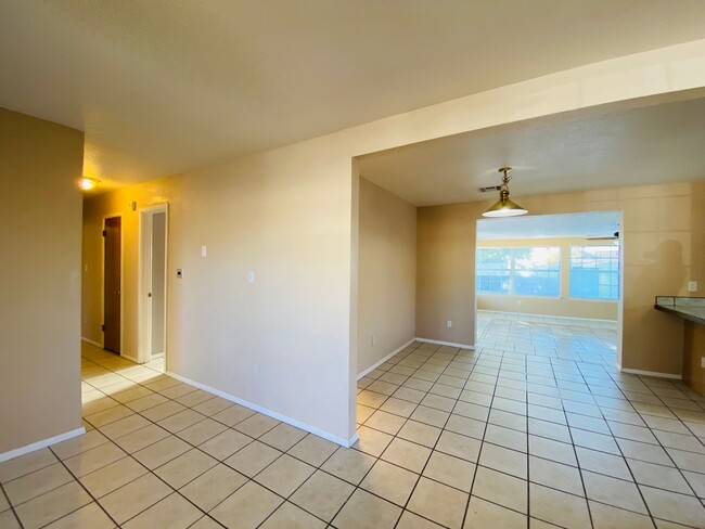 Building Photo - 4/2 Home with a backyard!
