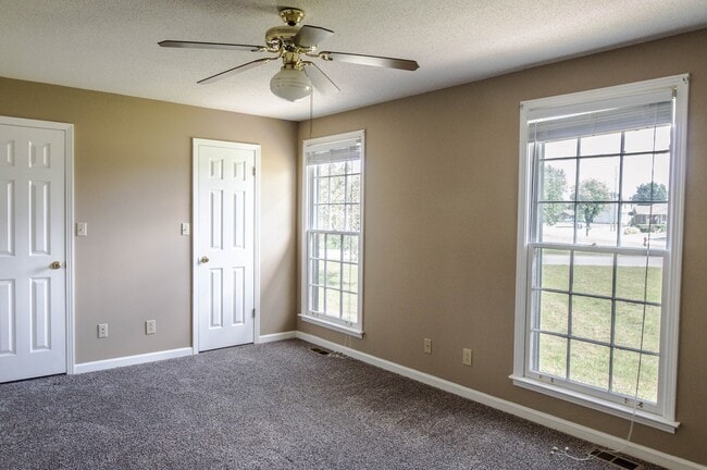 Building Photo - Dog Friendly Two Story with Fenced Yard!