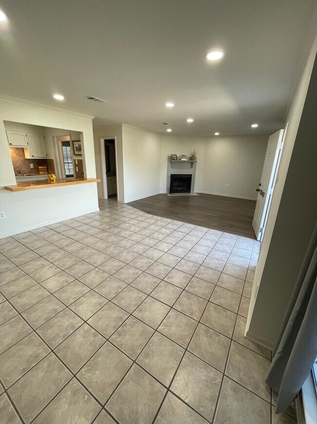 Easy flow from living, dining and kitchen offers a great flow for entertaining. - 12447 Coursey Blvd