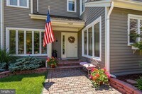 Building Photo - Experience elevated living in this beautifully renovated townhome nestled within the highly sough...