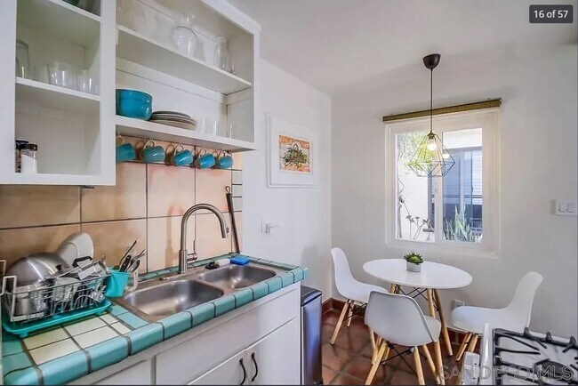 Building Photo - Charming, Fully Furnished Spanish-Style Du...