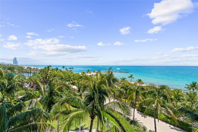 Building Photo - 10275 Collins Ave