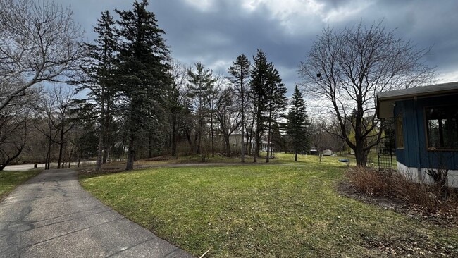 Building Photo - Wonderful 4BR 3BA w/ 2 Car Garage on 1.38 Acres in desirable Mendota Heights neighborhood!