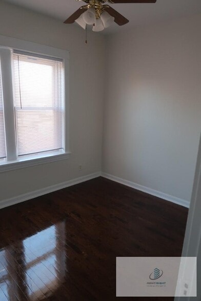 Building Photo - 4235 N Lamon Ave