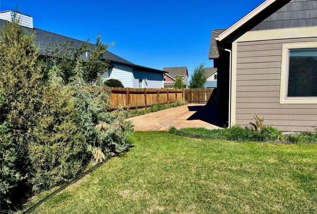Building Photo - Charming 4-Bedroom Home with Spacious Lawn in Bozeman, MT!