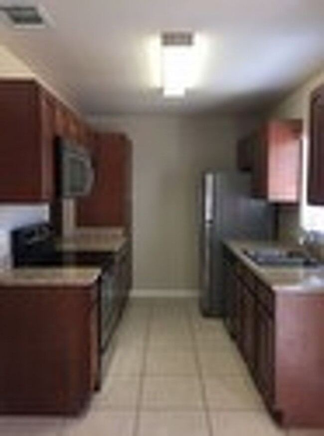 Building Photo - HIDDEN CREEK CONDO