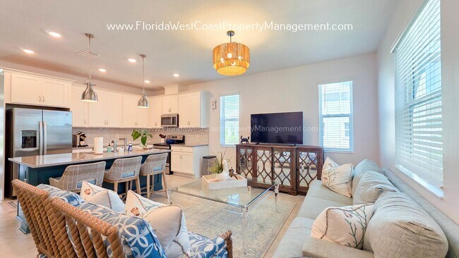 Building Photo - EXCEPTIONAL AND SPACIOUS FURNISHED TOWNHOME WITHIN WATERSIDE- NAUTIQUE!