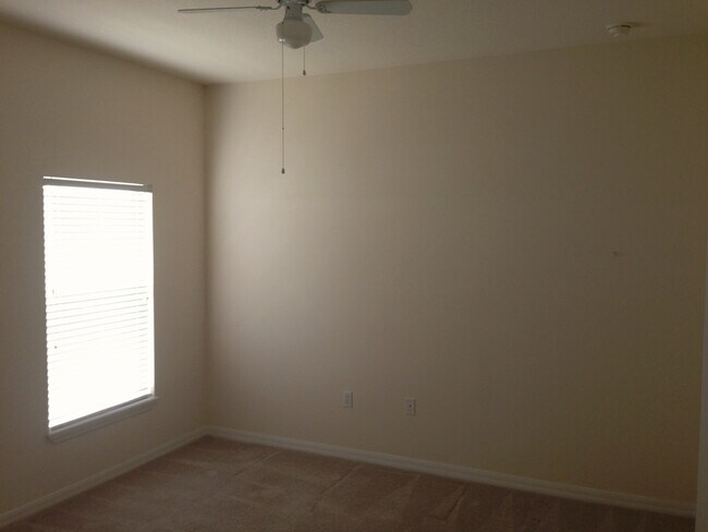 Building Photo - 3/2 House in the Gated Spring Lake Village Community with Water View