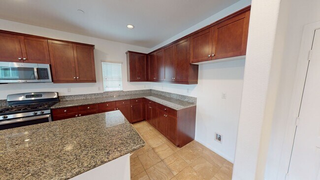 Building Photo - Available Now: Cozy 4 Bedroom 2.5 Bath Home in Rancho Cucamonga.