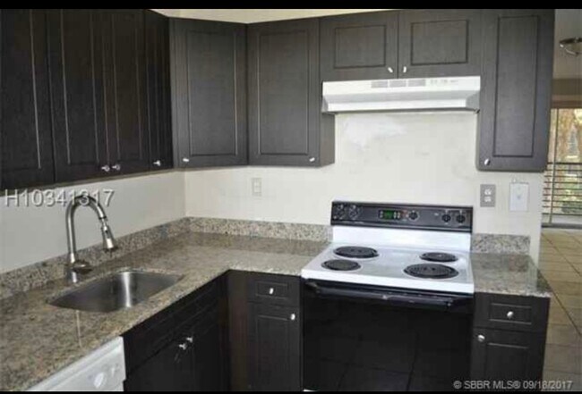 Updated kitchen - 701 Gardens Dr