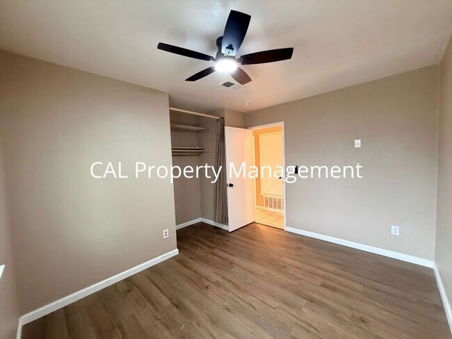 Building Photo - Spacious 4-Bedroom Home with 2-Car Garage & Backyard Oasis