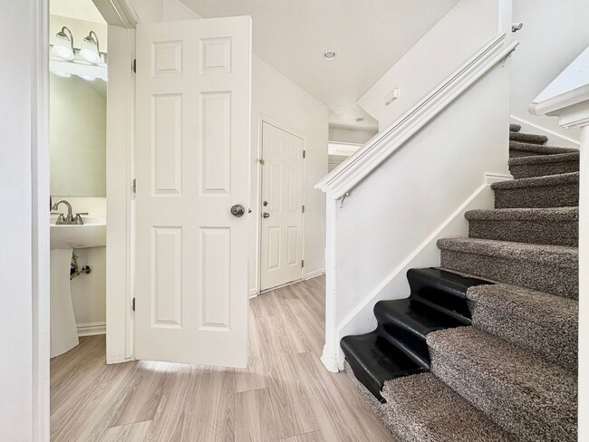 Building Photo - Spacious 3 Bed Townhome in West Valley City with Gated Yard, Garage & Pool