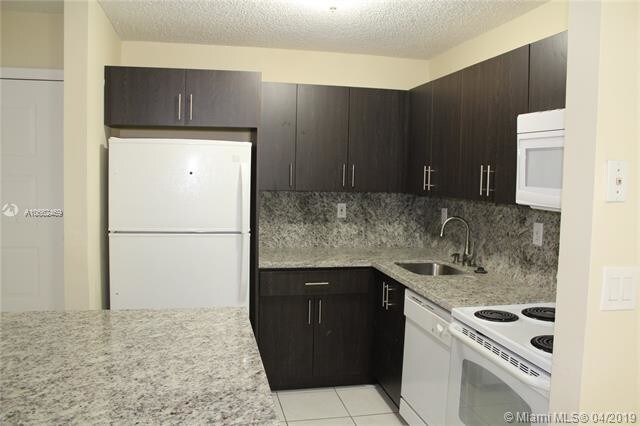 Building Photo - 4680 NW 102nd Ave  104-20