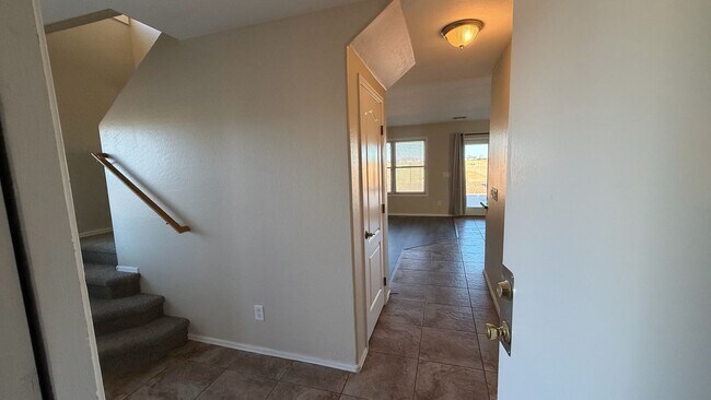 Building Photo - Spacious Surprise home with large backyard