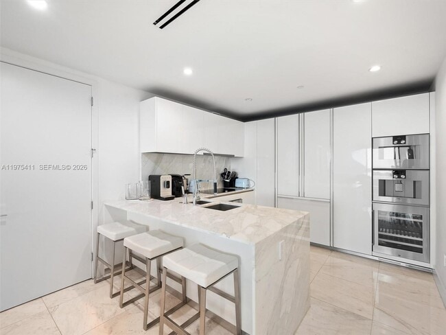 Building Photo - 10203 Collins Ave