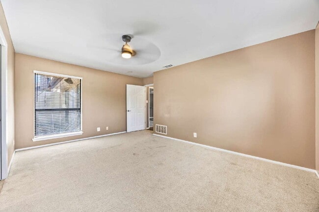 Building Photo - "Charming garden home offers 3-Bedroom Sanctuary with Cozy Fireplace in San Antonio – 1710 Sq Ft ...