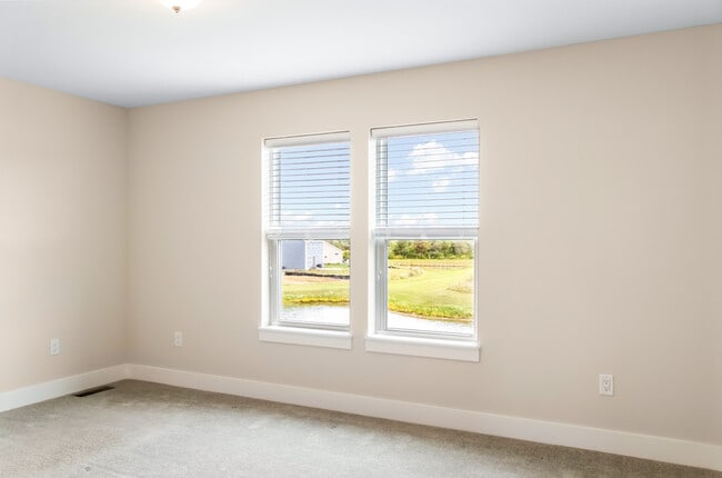 Building Photo - W218N16066 Tiger Lily Dr