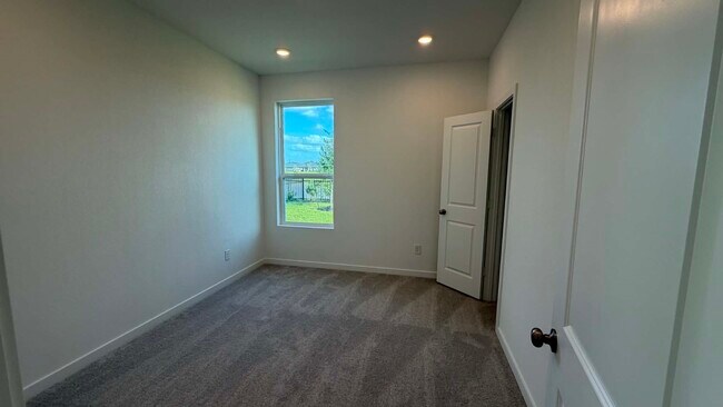 Building Photo - 27451 Sunterra Village Dr