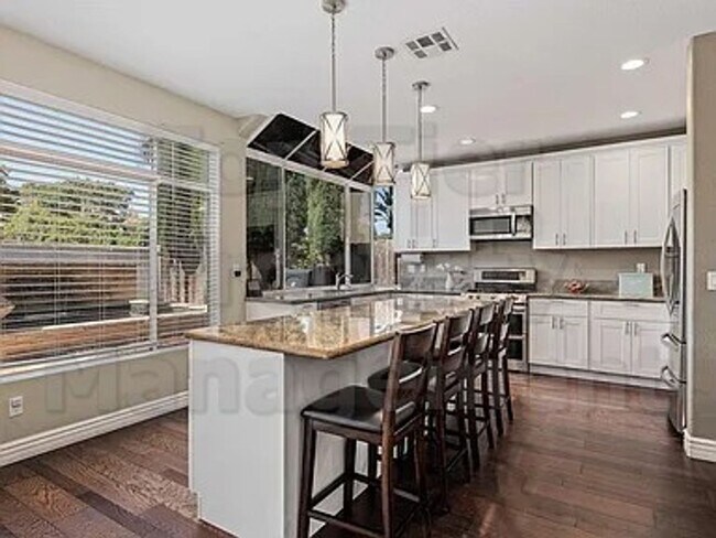 Building Photo - Luxurious 5-Bedroom Rancho Del Oro Home with Solar – Available Now!