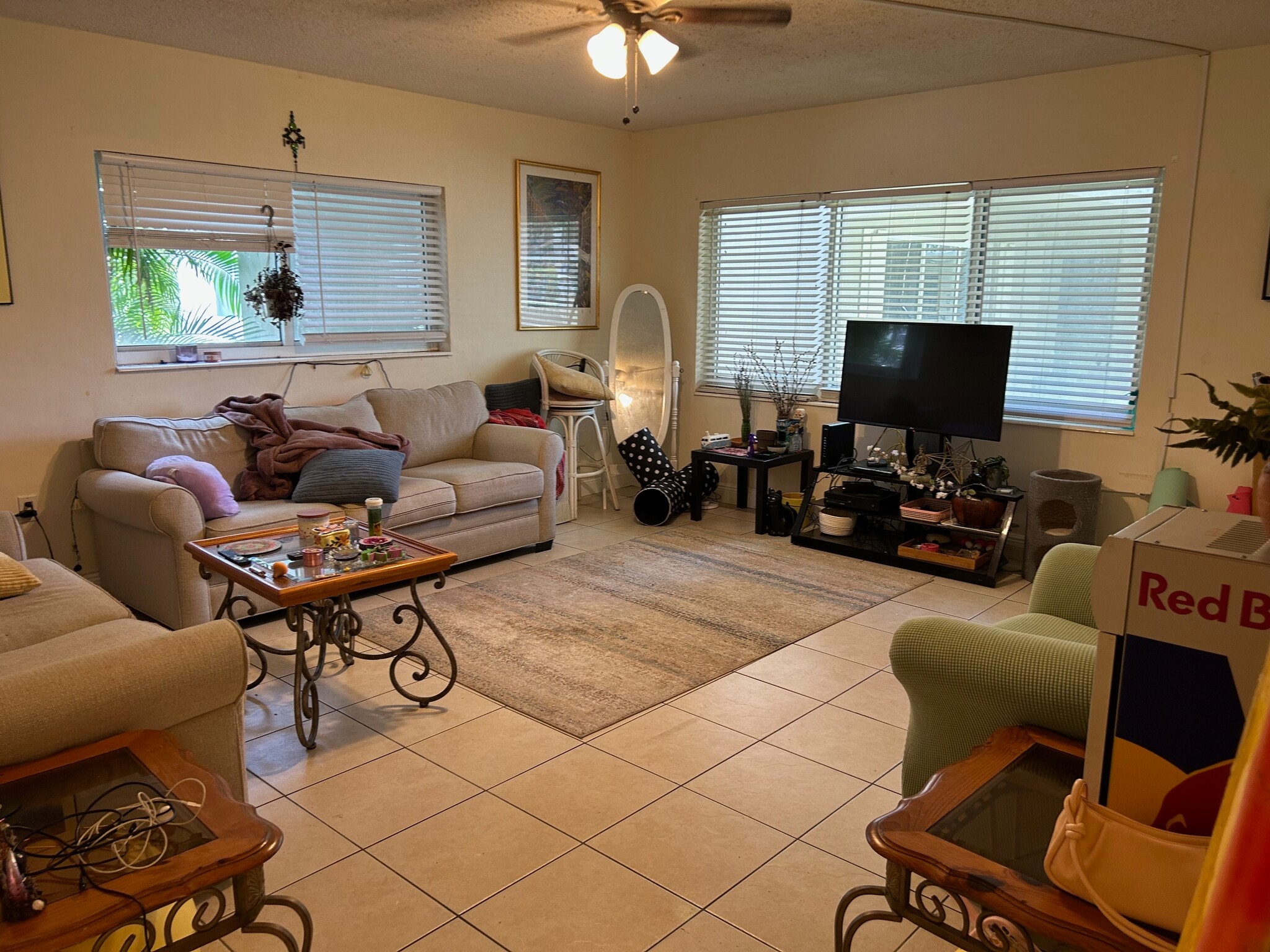living room with sofa and loveseat and smart TV - 265 SW 7th St