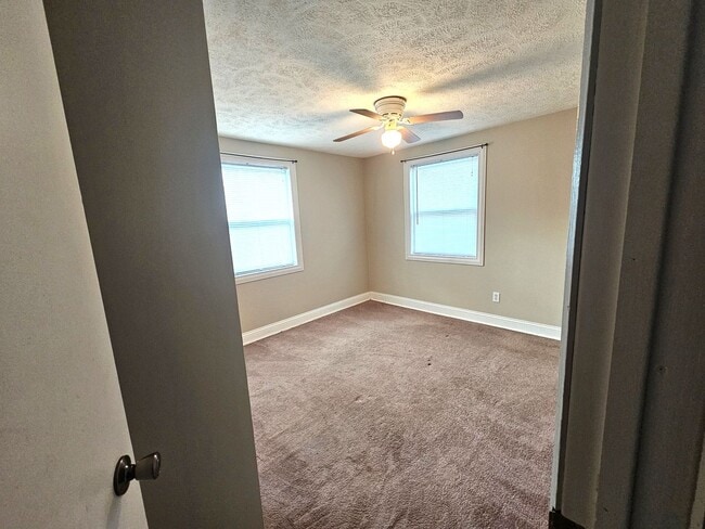 Building Photo - Charming Corner Lot House in Cadillac, Mic...