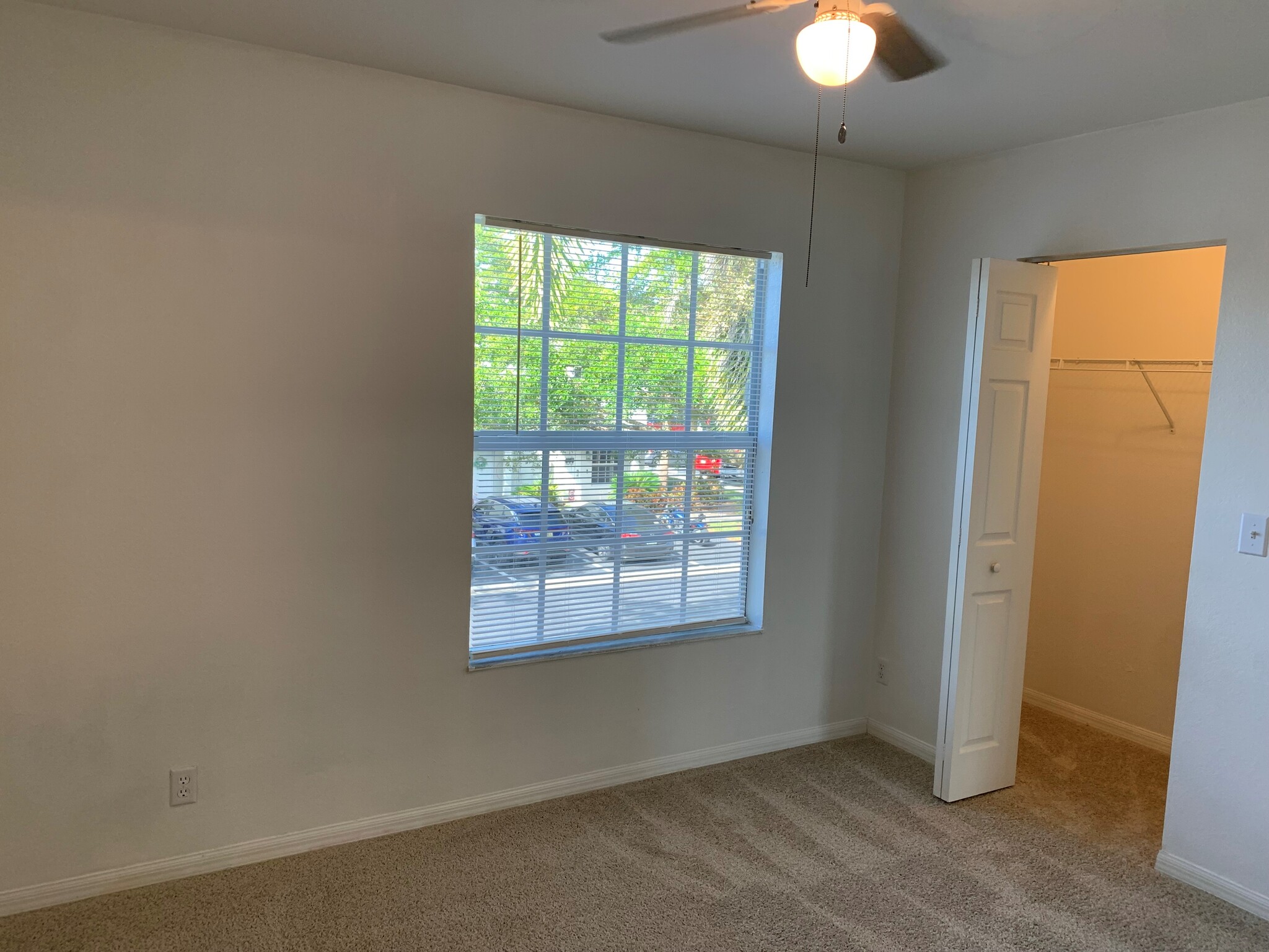 En suite secondqary bedroom with lots of light and closet space! - 10041 Poppy Hill Dr