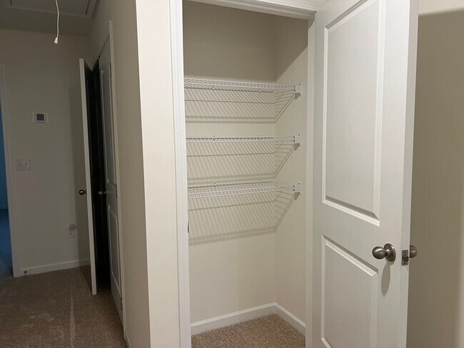 Building Photo - Beautiful New Construction 3 bedroom 2.5 Condo   with garage- Water, trash & sewer incuded!